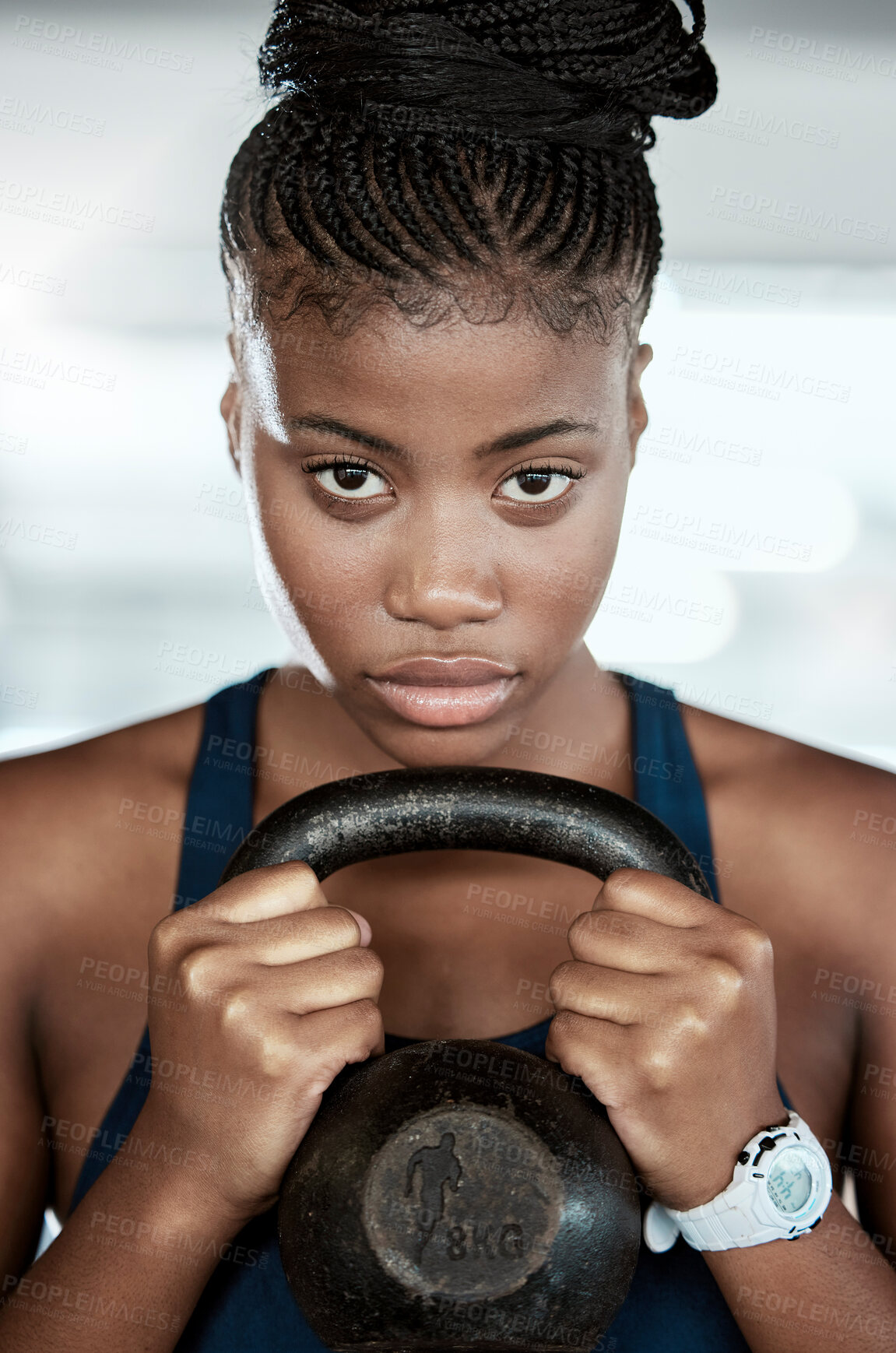 Buy stock photo Fitness, portrait or black woman in gym with a kettlebell for strength training, exercise or workout. Motivation, face or healthy strong athlete with focus or weight for muscle development or growth