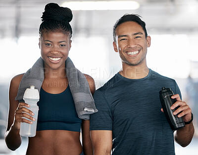 Buy stock photo Portrait, fitness and drinking water with a sports couple in the gym together after a workout. Diversity, smile and towel with a happy young man and woman in a health center for exercise or training