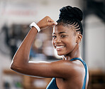 Portrait, fitness or black woman flexing muscle or body goals in training, workout or exercise at gym. Strong person, results or healthy African girl athlete with powerful biceps, motivation or focus