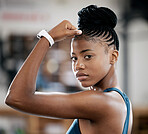 Portrait, fitness or black woman with strong biceps muscle or body goals in training, workout or exercise at gym. Face, results or healthy African girl sports athlete with power, motivation or focus