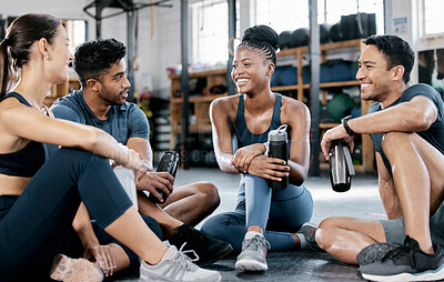Buy stock photo Fitness, conversation and friends at the gym for training, exercise motivation and relax after cardio. Laughing, happy and people with a group discussion about a workout, health class and performance