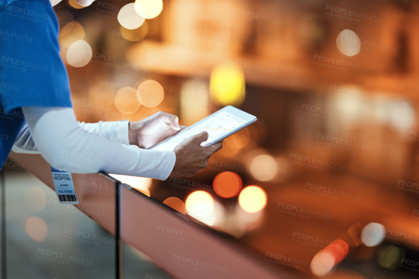 Buy stock photo Tablet, hands and nurse at hospital rooftop working on telehealth, research or online consultation in city. Bokeh, healthcare and woman with touchscreen technology for wellness app in clinic at night