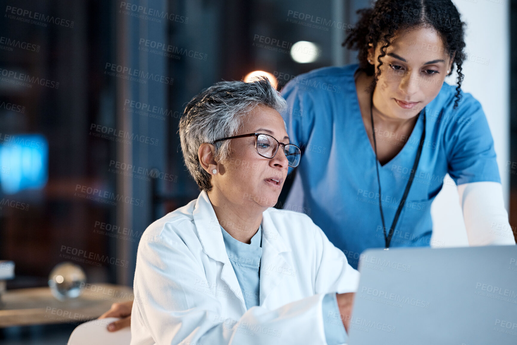 Buy stock photo Doctors, nurse or laptop in night teamwork, medical research or surgery planning in wellness hospital. Talking, thinking or healthcare women on technology for collaboration help or life insurance app