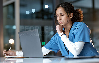 Buy stock photo Doctor, thinking and writing with laptop at night for healthcare solution, idea or planning at hospital. Woman medical nurse working late in focus for research with notebook and computer at clinic