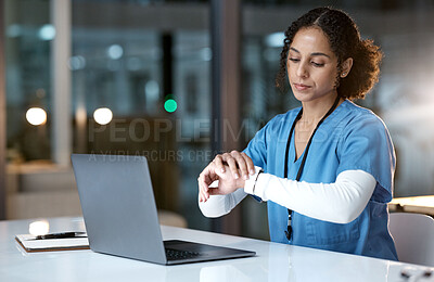 Buy stock photo Laptop, watch and night with a black woman nurse working overtime on research in a hospital for healthcare. Computer, medical and time with a female medicine professional at work late in the evening