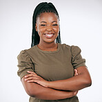 Black woman, portrait and smile with arms crossed in studio with casual style, fashion and confidence. Happy young female model, empowerment and happiness with hair braids, beauty or pride in Nigeria