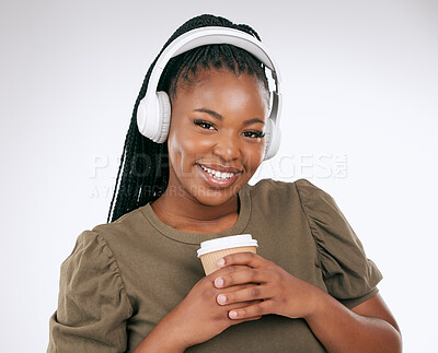 Buy stock photo Headphones, black woman smile and music portrait with coffee of a happy young person in a studio. White background, isolated and happiness of a excited female hearing audio and singing to song alone