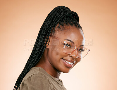 Buy stock photo Black woman, smile and retail frame portrait of a young person in a studio with happiness. Brown background, eye wellness and vision of a african female ready for lens frames choice and testing