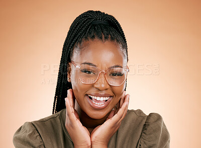 Buy stock photo Black woman, fashion and retail frame portrait of a young person smile in a studio with happiness. Brown background, eye health wellness and vision of  african female ready for lens frames choice