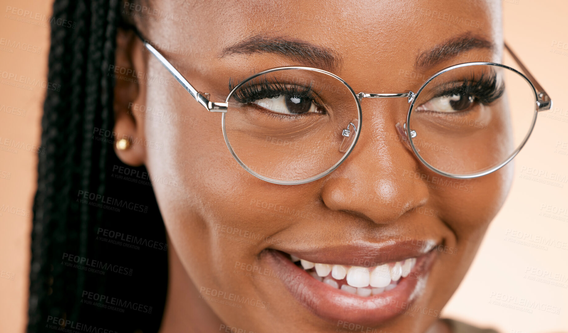 Buy stock photo Black woman, face zoom and smile with glasses, vision and prescription lens isolated on studio background. Eyewear, eye care and healthcare for eyes, happy girl with fashion frame and optometry