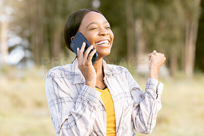 Buy stock photo African woman, celebrate and fist with phone call, outdoor or smile for winning, success or goal in summer. Adventure, smartphone conversation or good news for girl in sunshine, forest or celebration