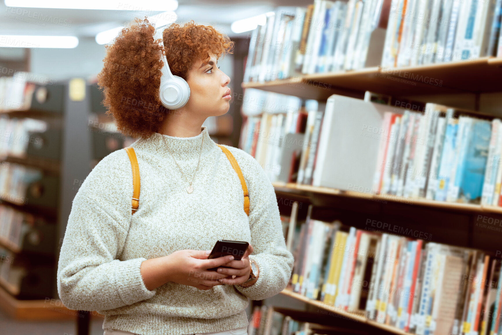 Buy stock photo Books, phone or student in a library to search for knowledge or university education for future growth. Scholarship, radio music or school girl in headphones studying or learning college information 