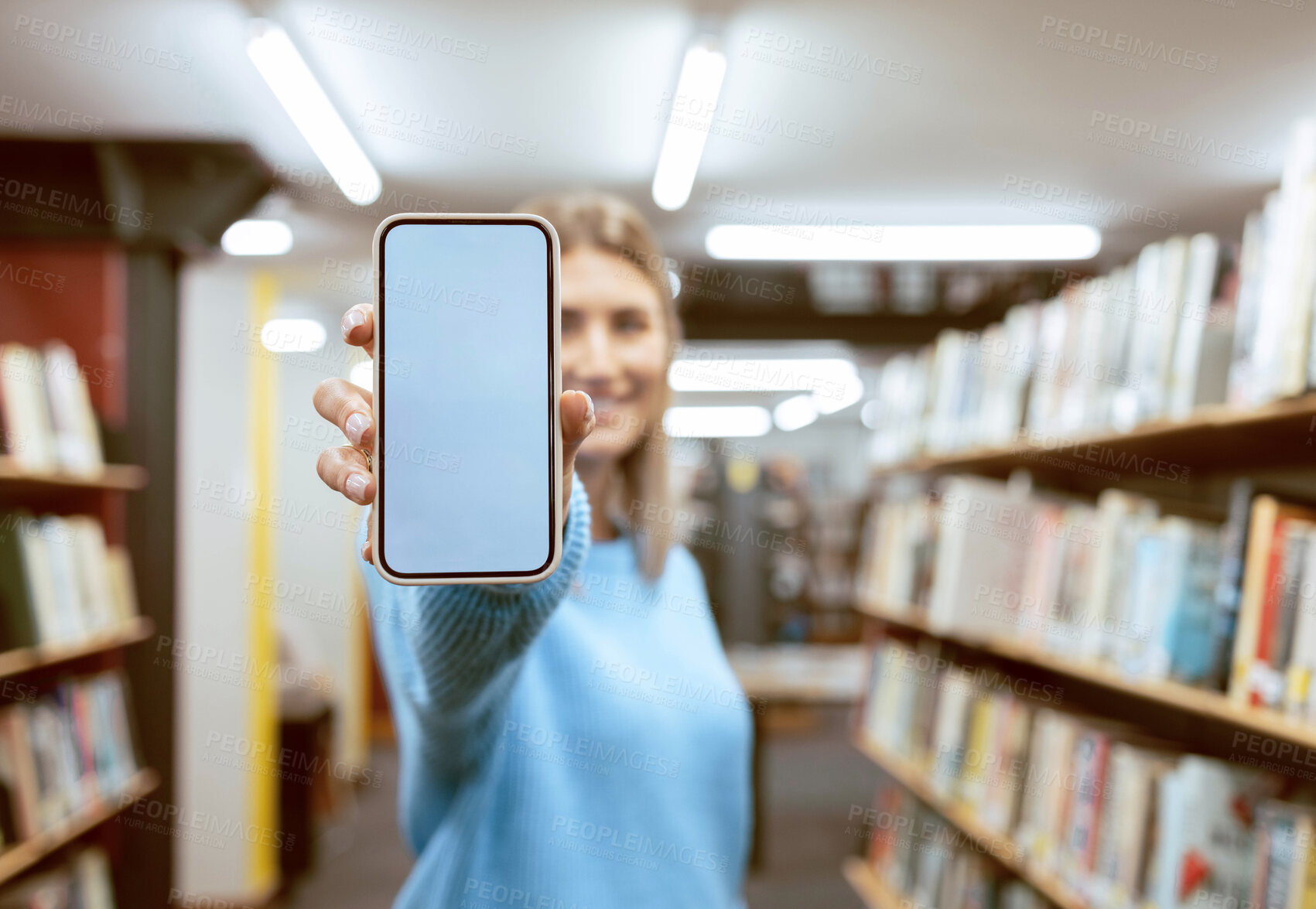 Buy stock photo Mockup screen, education or woman with phone in library for research, advertising or project management. Smile, happy or university student with tech for learning, scholarship study or web search
