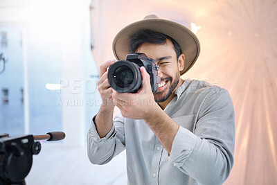 Buy stock photo Photographer, camera and man in studio for photoshoot, creative and happy on space, mockup and background. Magazine, photography and backstage shooting professional male having fun session in Japan