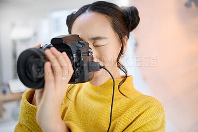 Buy stock photo photography, camera and woman in studio shooting creative memory picture, photoshoot or digital production. Lens focus, art creativity and young Japanese photographer girl working for artistic shot