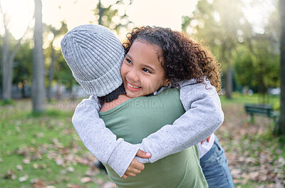 Buy stock photo Nature, love and child hugging mother in park with smile on autumn morning for family outdoor time together. Hug, play  and laugh, mom and small girl in garden having fun at picnic or forest walk.