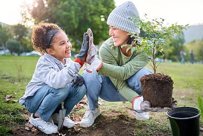 Buy stock photo Child, woman and high five for plant gardening at park with trees in nature environment, agriculture or garden. Happy volunteer family celebrate planting for ecology and sustainability on Earth day