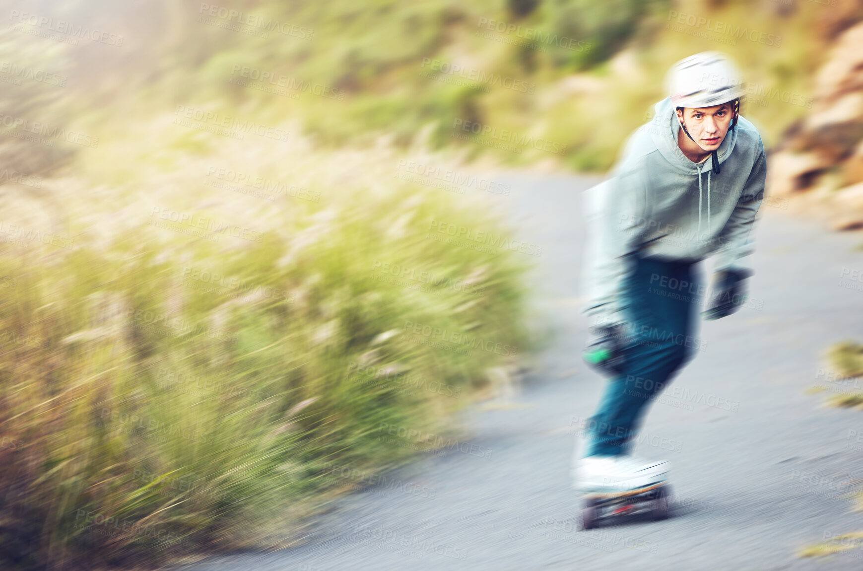 Buy stock photo Skateboard, skating sports and man on road for fitness, exercise or wellness. Training, freedom and portrait of male skater moving with fast speed, skateboarding and riding alone outdoors for workout