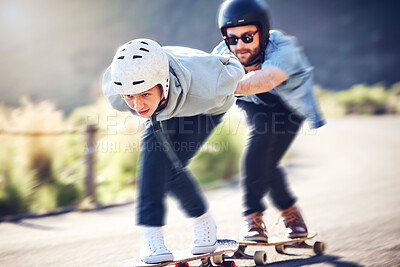 Buy stock photo Skating, longboard and friends riding fast on a road, racing downhill with skateboard and helmet for safety. Extreme sports, speed and people or skateboarder in action on mountain pass