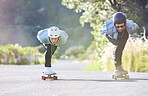 Friends, speed and couple longboard skating in road, racing downhill with skateboard and helmet for safety. Extreme sports adventure, skateboarding street race and skateboarder ride on mountain pass.