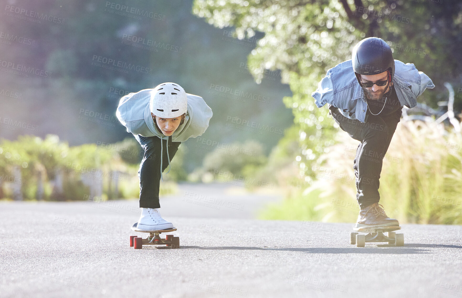 Buy stock photo Friends, speed and longboard skating in road, racing downhill with skateboard and helmet for safety. Extreme sports adventure, skateboarding street race and skateboarder ride on mountain pass.