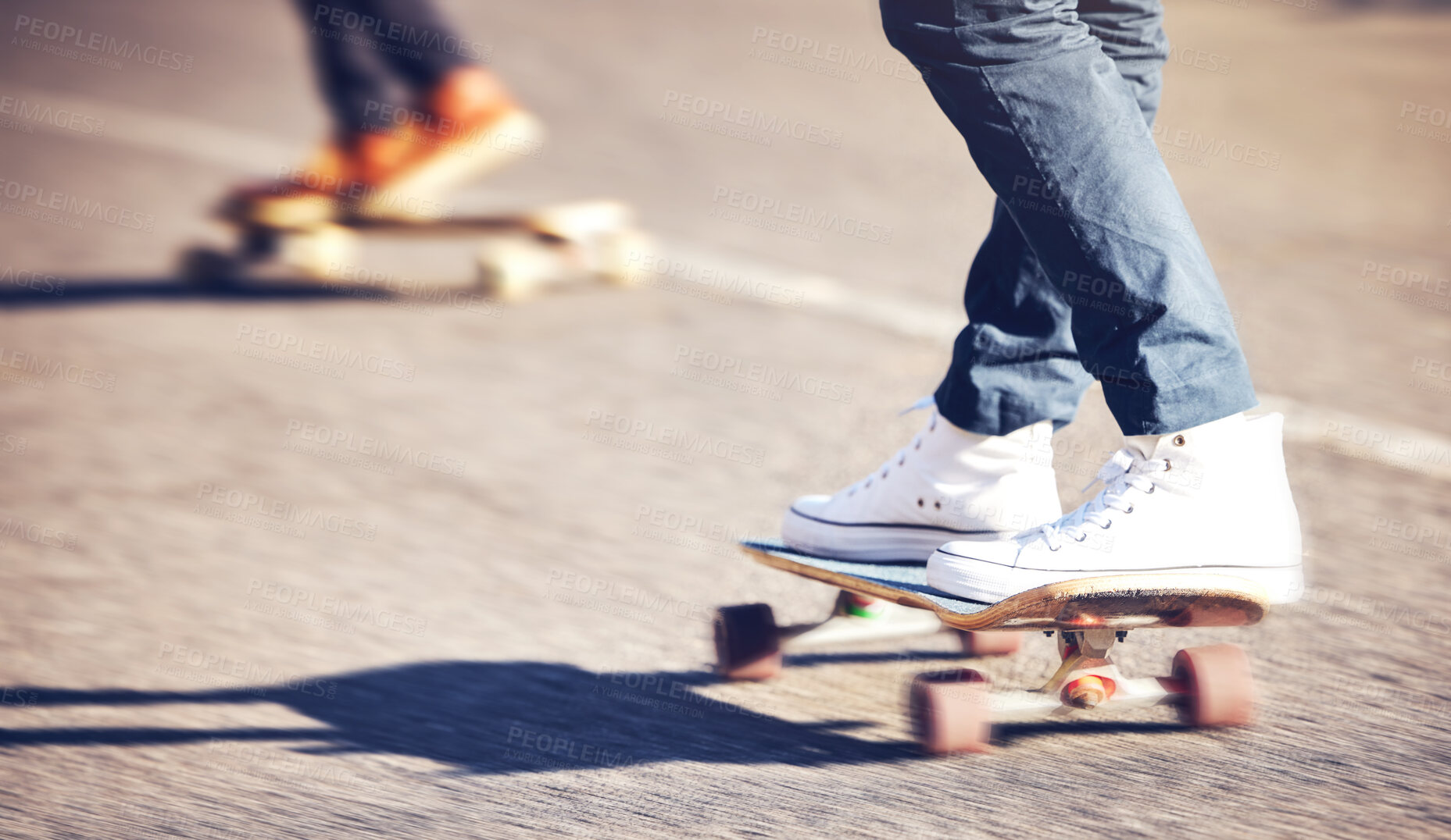 Buy stock photo Street, feet on skateboard and friends skating at skatepark with speed, skill and balance on road. Freedom, urban fun and gen z skateboarder hobby, legs and skate trick skateboarding for transport.