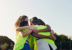 Support, hug and team huddling for hockey, game motivation and sports on a field in Australia. Team building, planning and athlete girls with a circle huddle for teamwork, training and sport