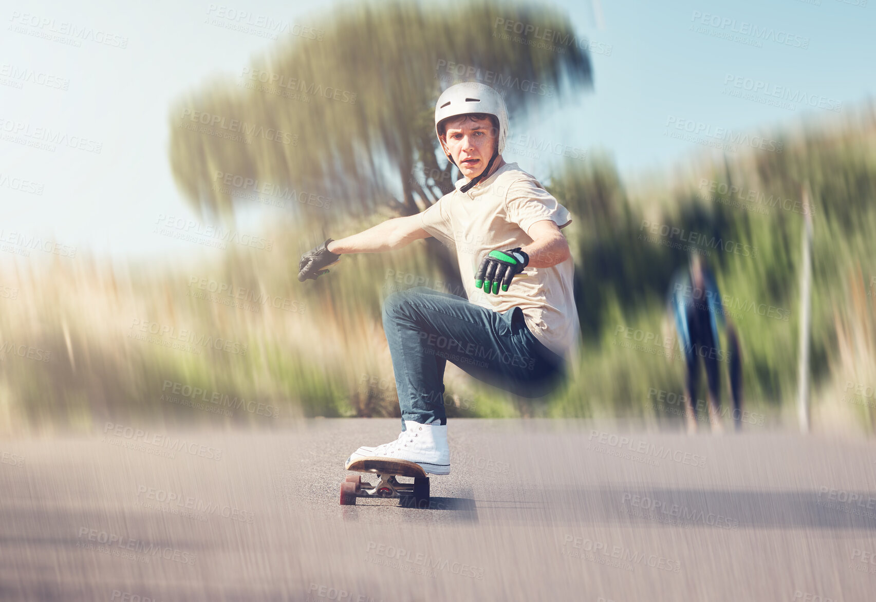 Buy stock photo Skate, motion blur and fast with a sports man skating on an asphalt street outdoor for recreation. Skateboard, soft focus and speed with a male athlete or skater training outside on the road