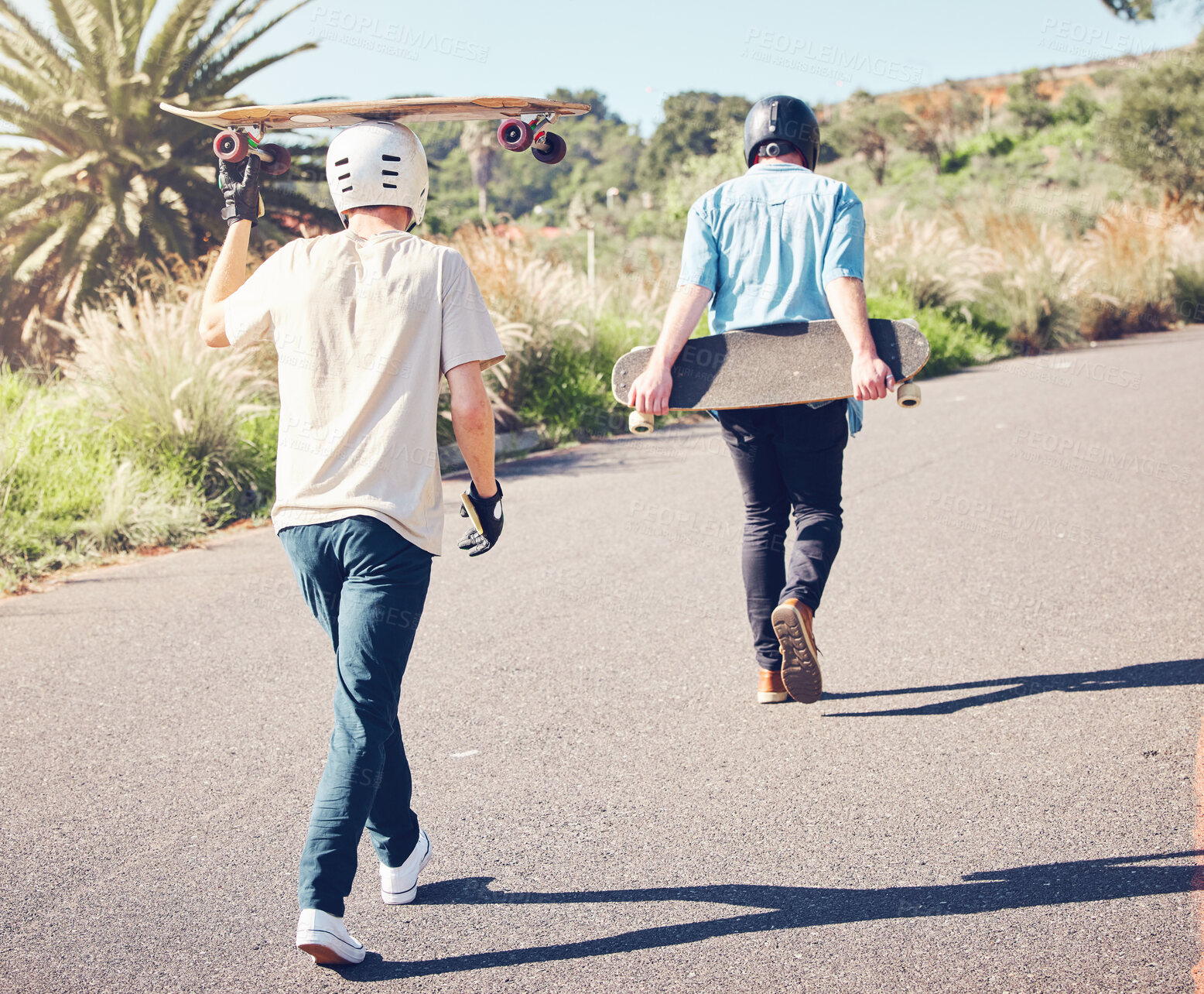 Buy stock photo Skateboard, sports and friends walking in road ready for adventure, freedom and leisure exercise on mountain. Friendship, skateboarding and skater men with longboard for exercise, skating and fitness