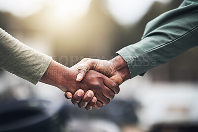 Buy stock photo People, hands and handshake for agreement, deal or trust in partnership, unity or support on a blurred background. Hand of team shaking hands for community, teamwork or collaboration in the outdoors