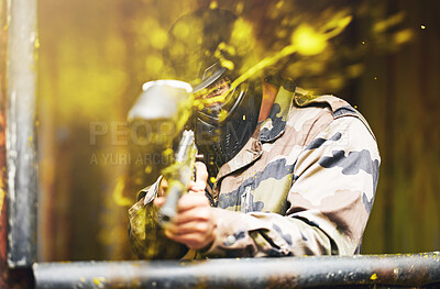 Buy stock photo Paintball, soldier and camouflage with a sports man playing a military game for fun or training outdoor. War, gun and target with a male athlete shooting a weapon outside during an army exercise
