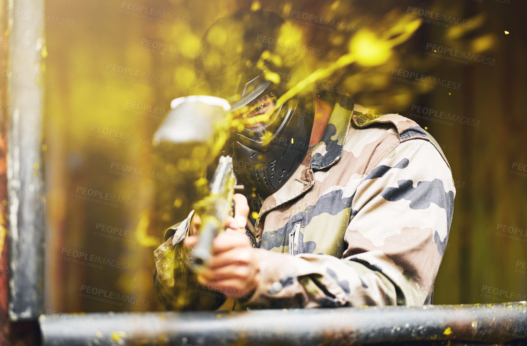 Buy stock photo Paintball, soldier and camouflage with a sports man playing a military game for fun or training outdoor. War, gun and target with a male athlete shooting a weapon outside during an army exercise