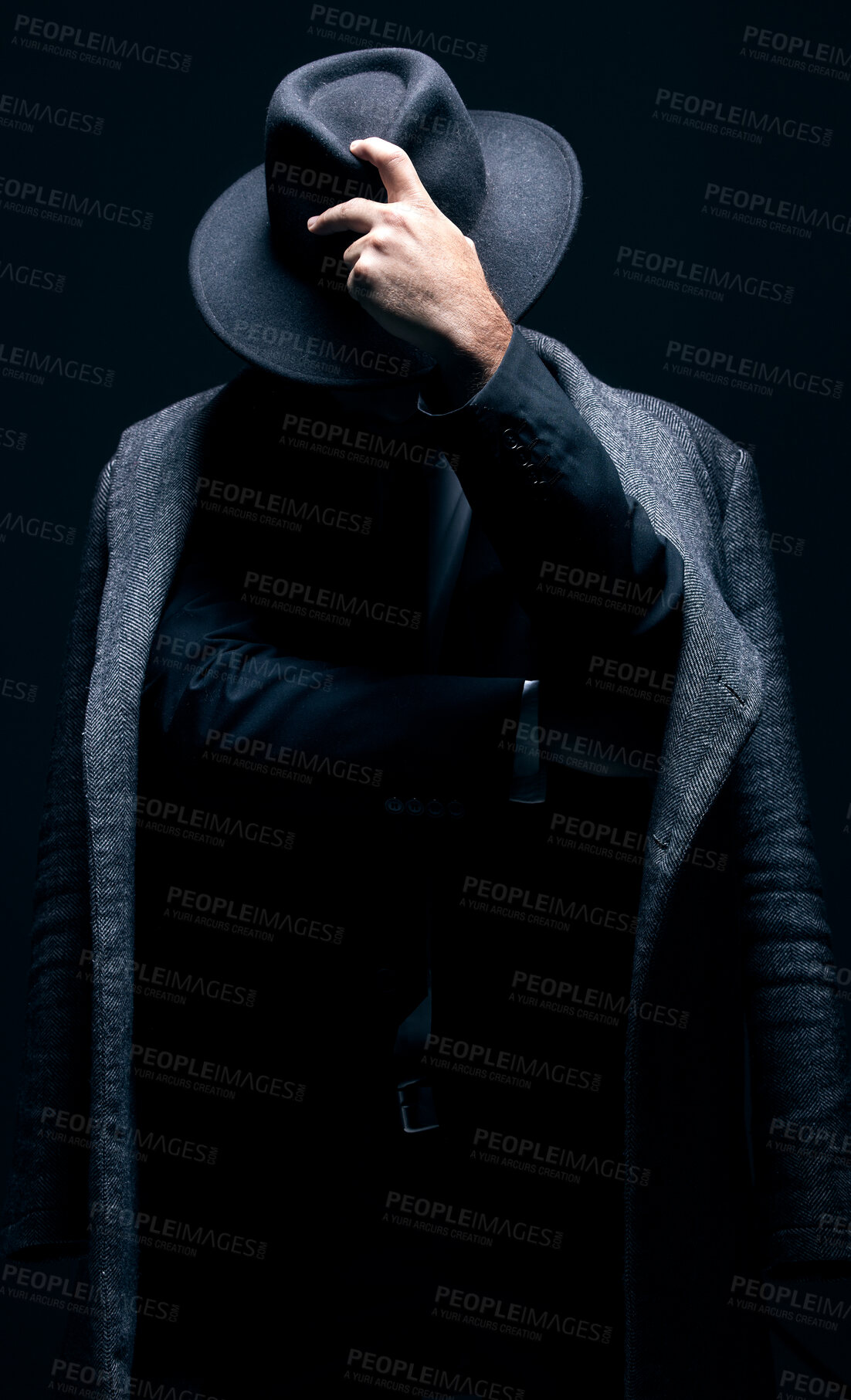 Buy stock photo Vintage, classy and mystery man in a suit isolated on a dark background in a studio. Business fashion, retro and stylish secret businessman for crime investigation, spy work and agent on a backdrop