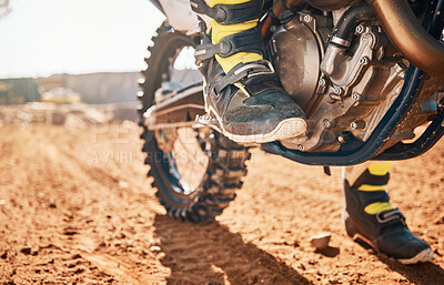 Buy stock photo Dirt road, competition and man feet on motorcycle in desert for exercise, training or rally. Offroad, fitness and male athlete or biker riding on motorbike for action, adventure and extreme sports.