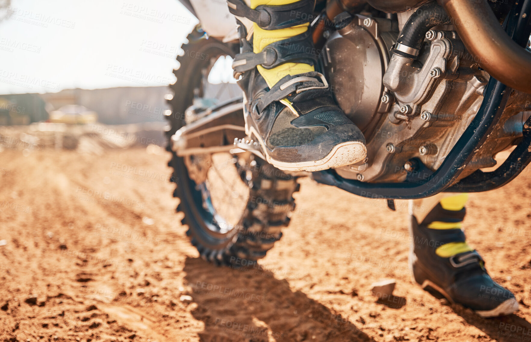 Buy stock photo Dirt road, competition and man feet on motorcycle in desert for exercise, training or rally. Offroad, fitness and male athlete or biker riding on motorbike for action, adventure and extreme sports.