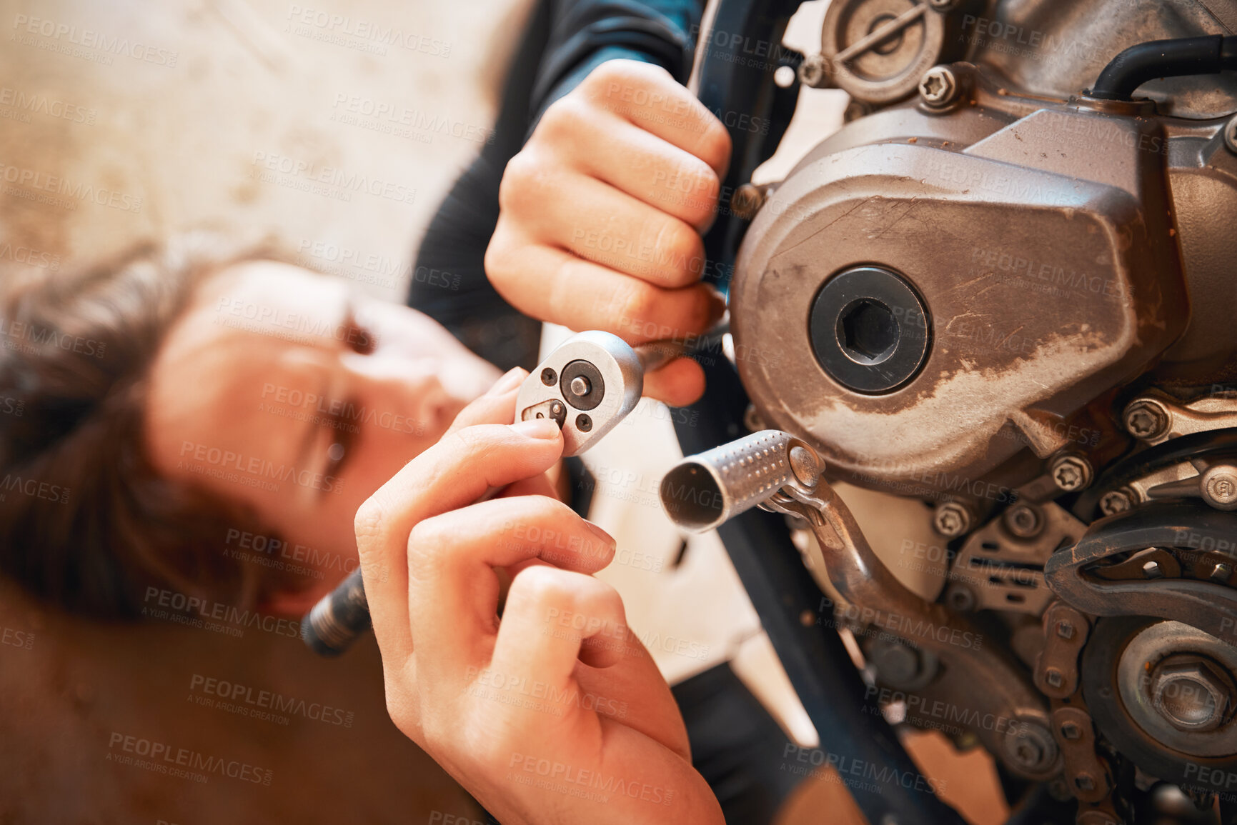 Buy stock photo Hands, mechanic and engine repairs working on motor with tools for racing, safety or mechanical part. Hand of engineer fixing motorbike, transport or transmission on automobile or vehicle in workshop