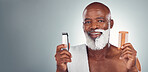 Black man, beard and shaving with razor, cream or comb in cosmetics for skincare, grooming or self care against gray studio background. Portrait of happy African American male and shave kit on mockup