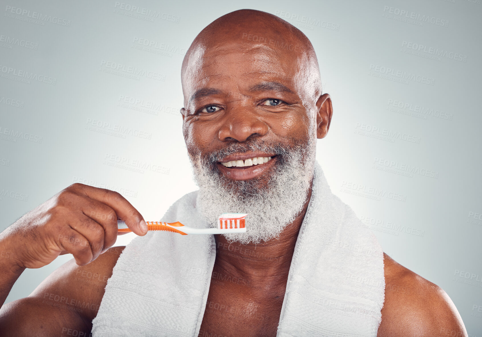 Buy stock photo Black man brushing teeth, smile and toothbrush, mouth care and fresh breath, hygiene isolated on studio background. Health, wellness and cleaning with dental portrait, senior person and retirement