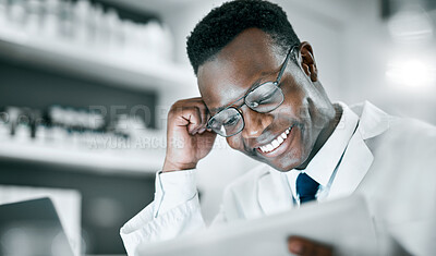 Buy stock photo Doctor, black man and tablet in lab for research, medical knowledge or happy for success, healthcare or career. Scientist, mobile touchscreen tech and focus for pharma innovation, motivation and goal