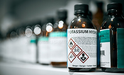 Buy stock photo Science, pharmaceutical chemical and bottle on shelf in laboratory for medical research. Healthcare, medicine and innovation in manufacturing of poison antidote with danger on warning label in lab.