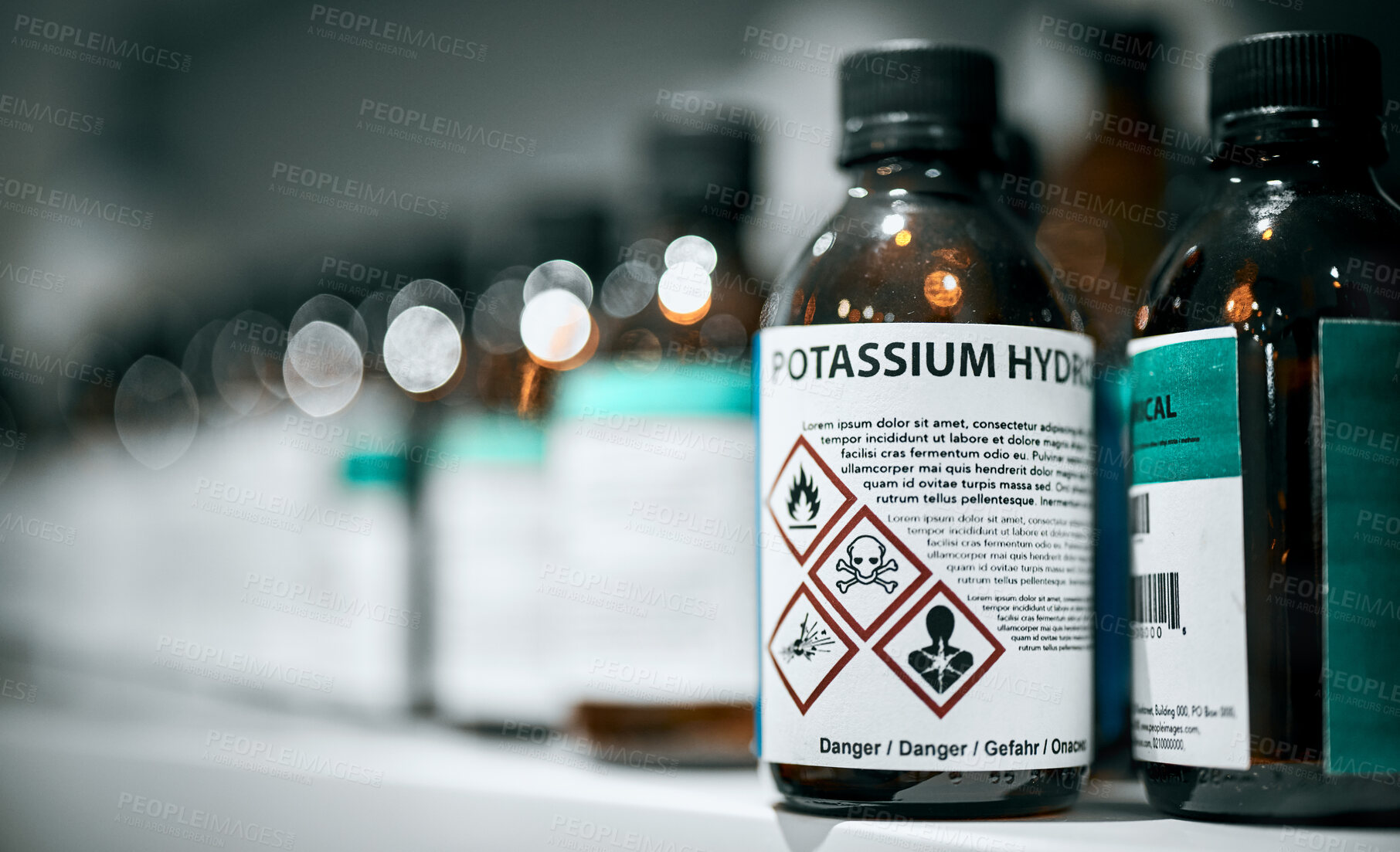 Buy stock photo Science, pharmaceutical chemical and bottle on shelf in laboratory for medical research. Healthcare, medicine and innovation in manufacturing of poison antidote with danger on warning label in lab.