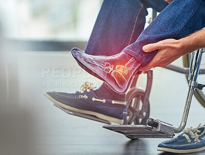 Buy stock photo Closeup, man in wheelchair and foot injury with pain, inflammation and accident with torn muscle. Zoom, male and guy in pushchair, highlighted for strained area and disability with broken ankle