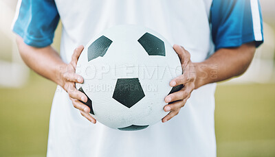 Buy stock photo Hands, ball and soccer player ready for sports match, game or competition on the outdoor field. Hand holding round sphere object for sport, training or practice in physical activity outside in nature