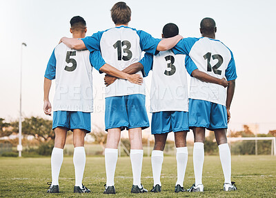Buy stock photo Soccer, team and hug standing with back on the field in partnership, trust or ready for sports game or match. Sport men hugging in teamwork, collaboration or unity for fitness, training or workout