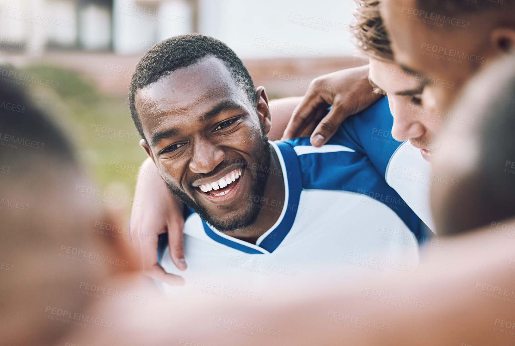 Buy stock photo Black man, soccer team and football athlete outdoor in group hug before sports game on field. Sport training, teamwork and excited African player happy about fitness exercise and workout with people