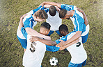 Soccer men, huddle and motivation for sports competition or game with teamwork on a field. Football group people with planning strategy, support and trust for collaboration with diversity at training