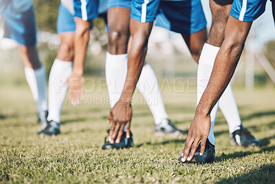 Buy stock photo Man, soccer players and stretching legs before sports game, match or start on outdoor field. Group of men in team warm up stretch preparation for fitness training or football practice on green grass