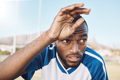 Buy stock photo Tired black man, face and soccer player on outdoor field, playing game or football training with energy and exhausted athlete. Team sport, sweating and fitness, challenge and fatigue with workout
