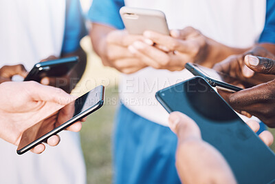 Buy stock photo Connection, social media and hands with phone for communication, bluetooth and soccer chat. Networking, sync and football players reading information or strategy on a mobile in a circle for sports