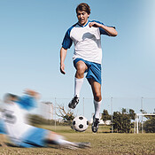 https://images.peopleimages.com/picture/202301/2601444-soccer-tackle-and-motion-blur-with-a-sports-man-running-on-a-field-during-a-competitive-game-or-training.-football-fitness-or-health-and-a-male-athlete-or-player-on-a-pitch-with-an-opponent-box_175_175.jpg